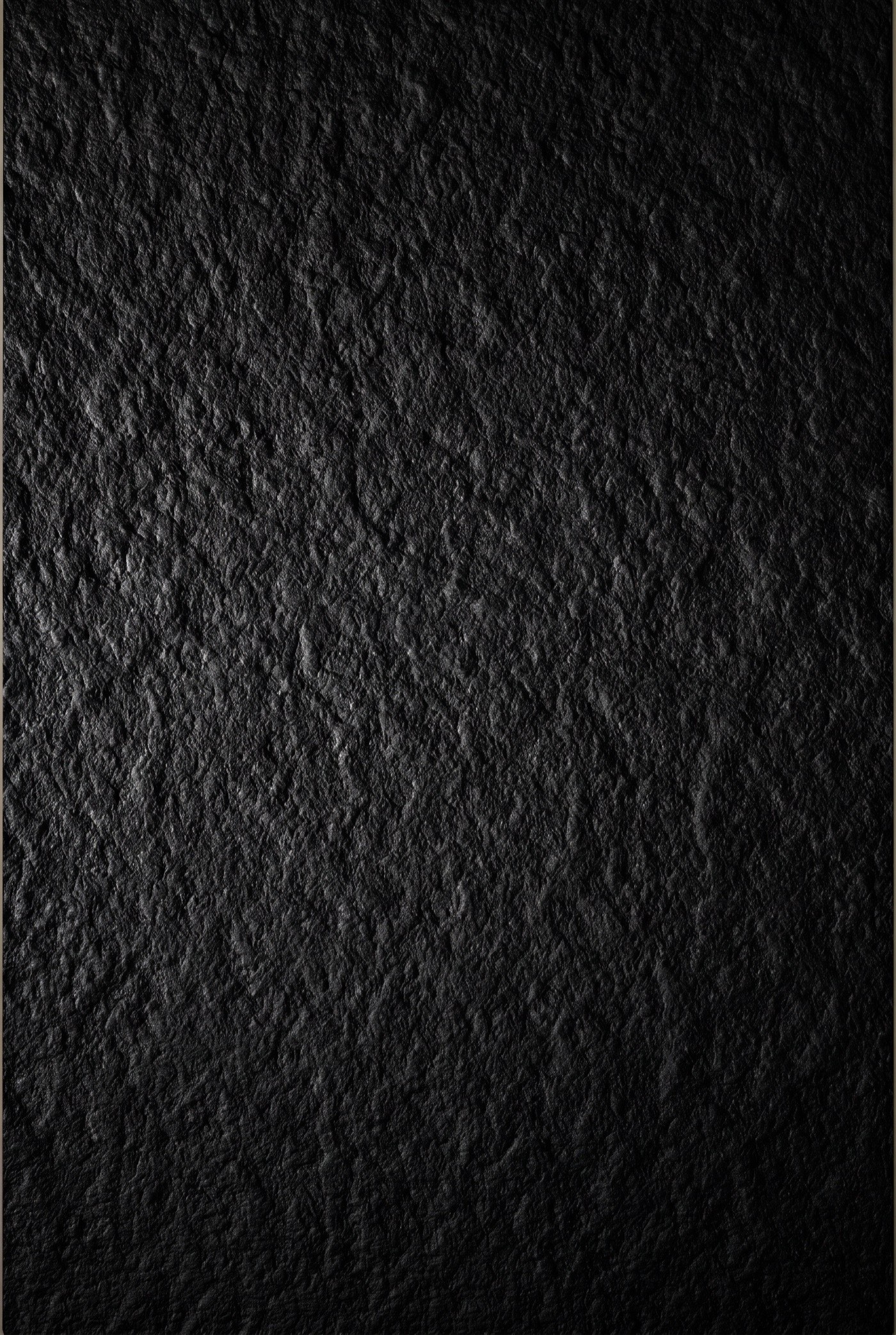 Absolute Black flamed granite with a deep, matte, textured finish