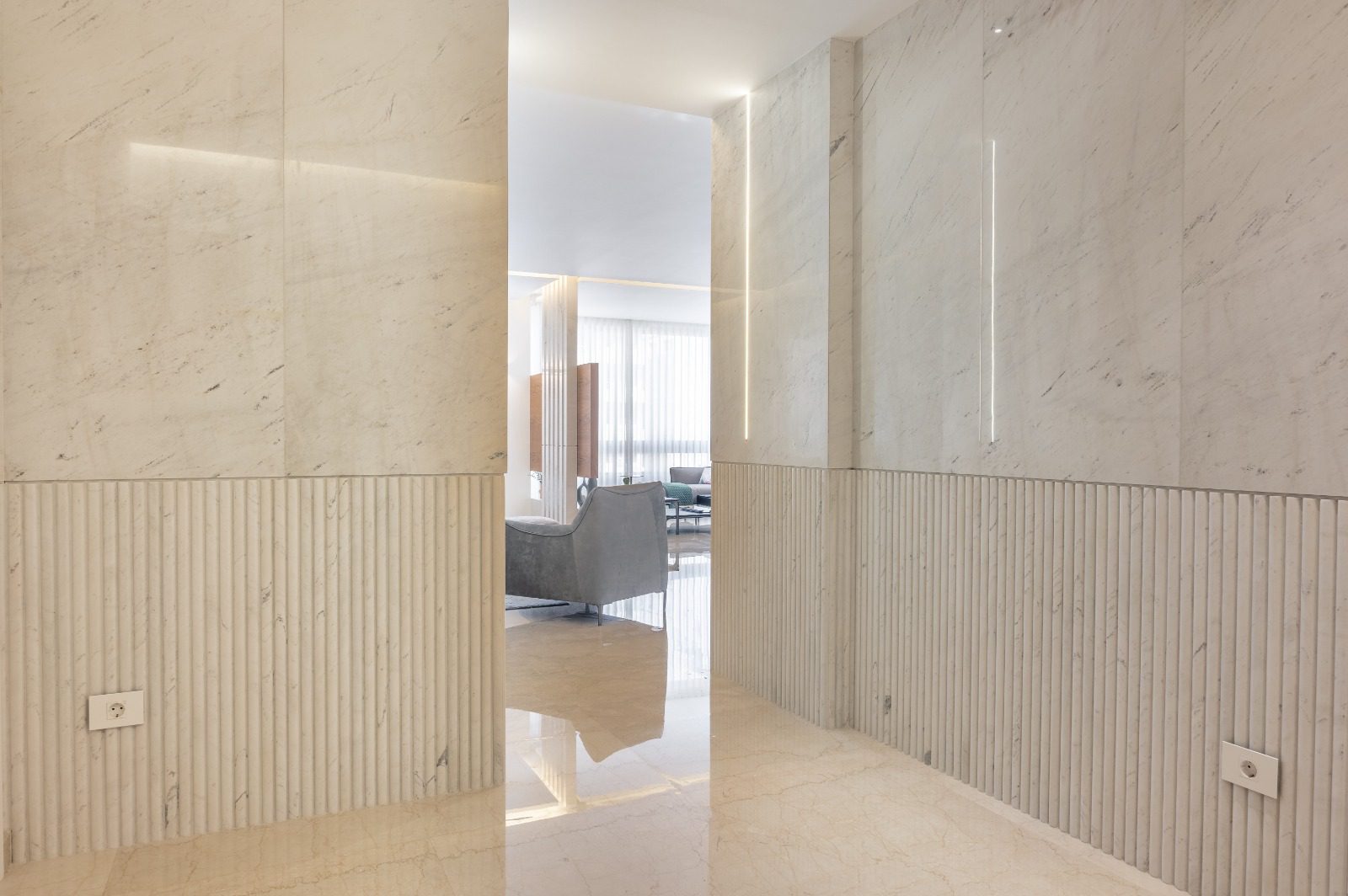 Marble-lined corridor in a private residence